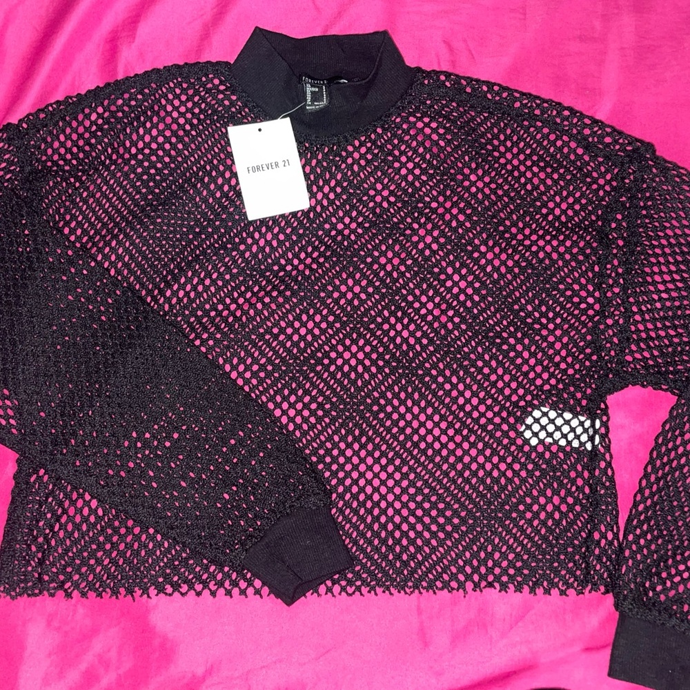 Mesh/fishnet like crop top.